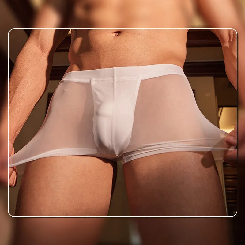 Men's black nylon boxer briefs laid flat, showing low-rise waistband and leg openings.