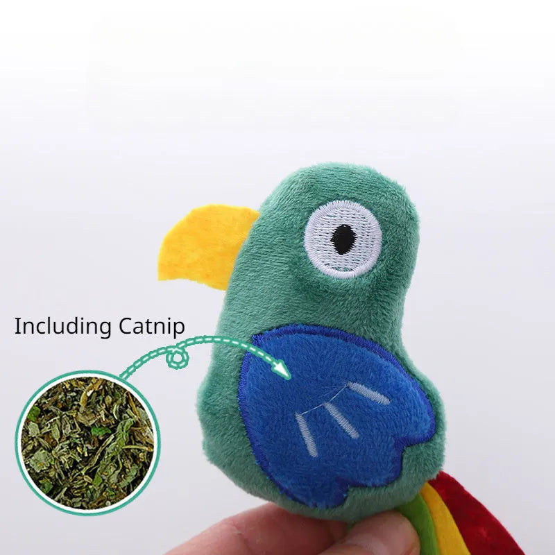 Cow shaped plush cat toy on a string handle with dangling feather, catnip inside.