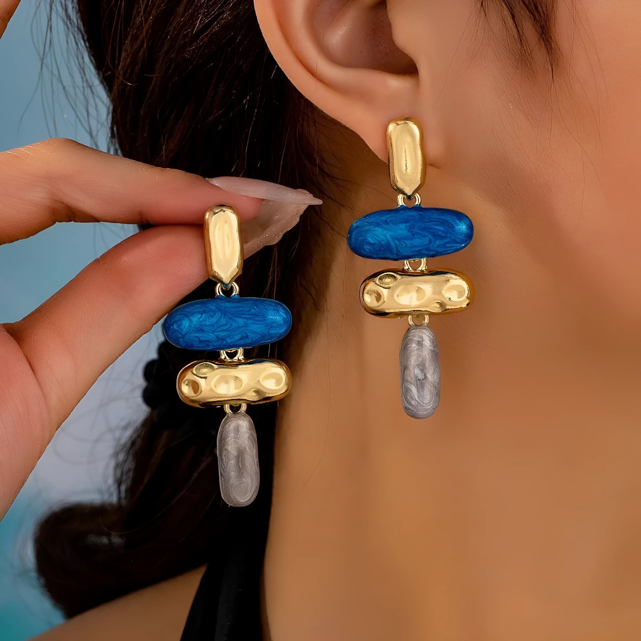 Geometric stud earrings with multicolour electroplated finish on zinc alloy