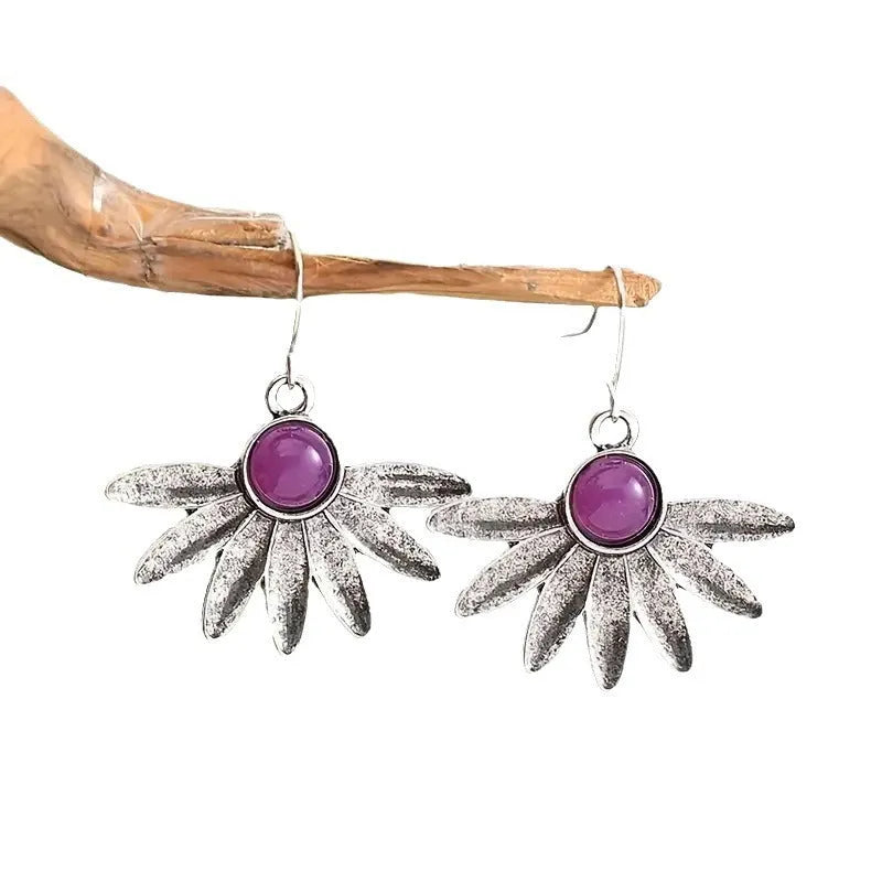 Purple Bohemian style flower earrings with animal zodiac design and resin gemstone detailing