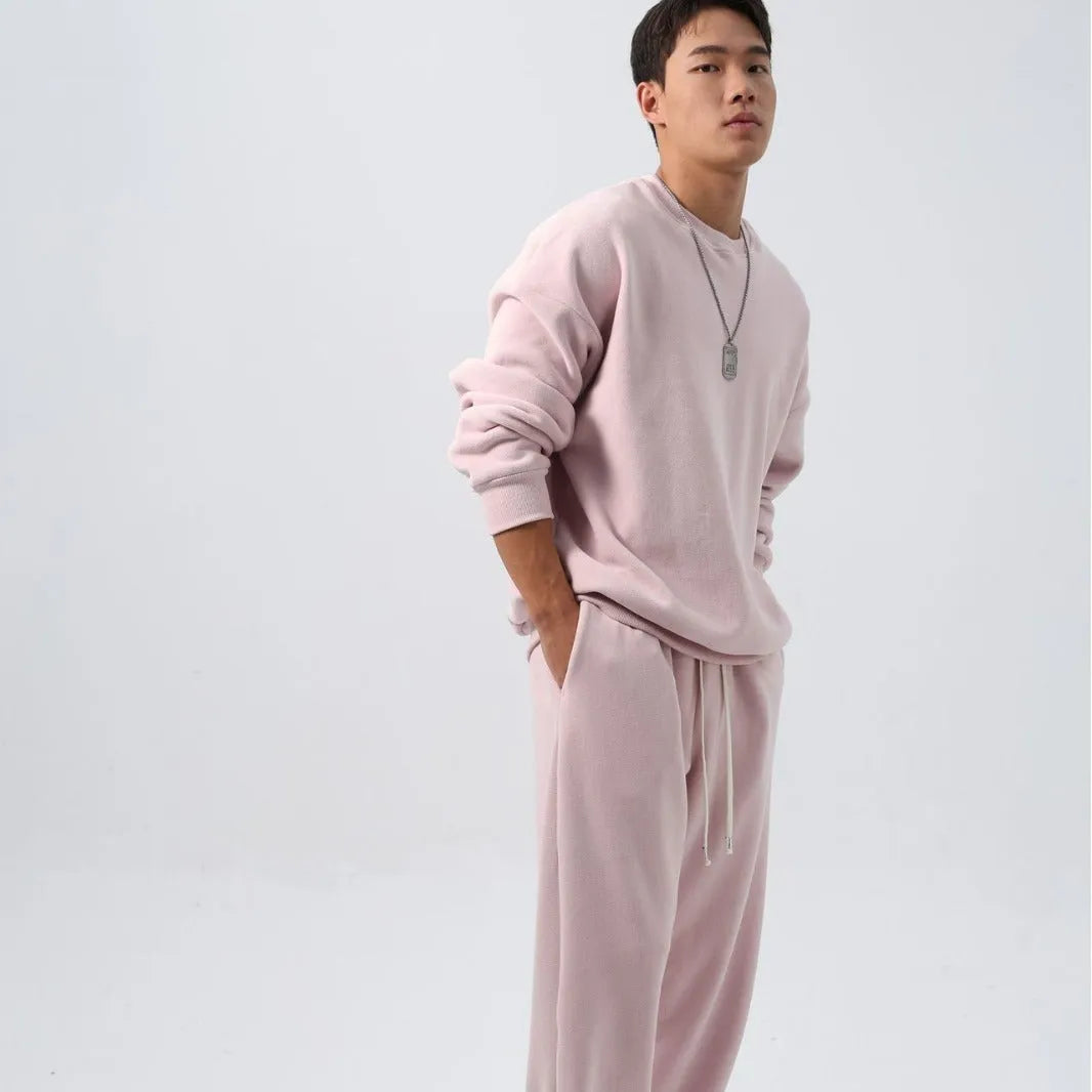 Men's black polar fleece sports suit with padded crew-neck coat and matching trousers
