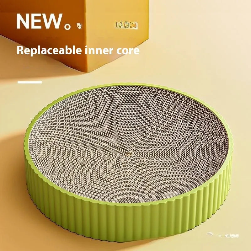 Green round corrugated cardboard cat scratching board measuring 55cm with two replacement pads.