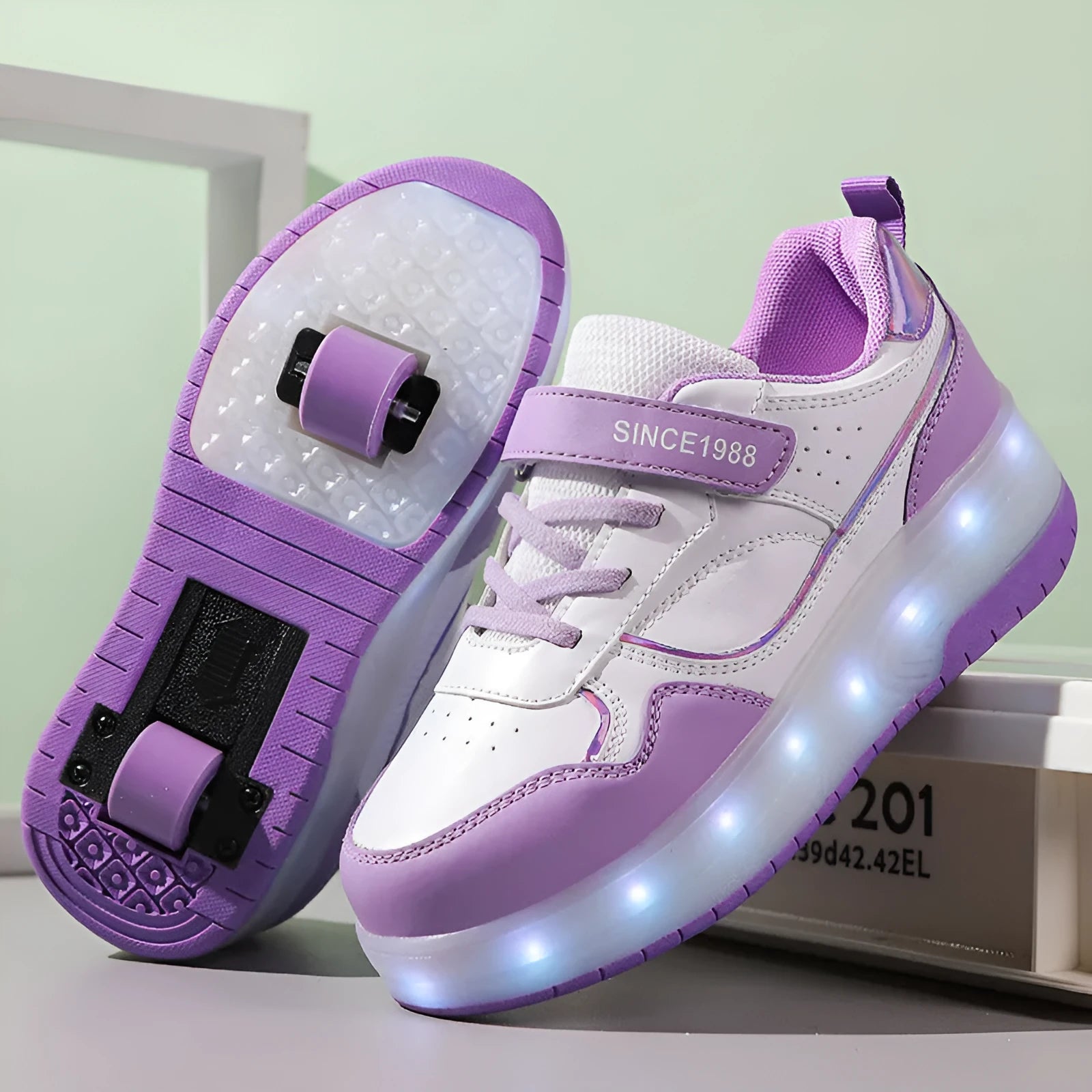 Charging flash rollerskates with LED lights in pink, white, black or purple with two or four wheels