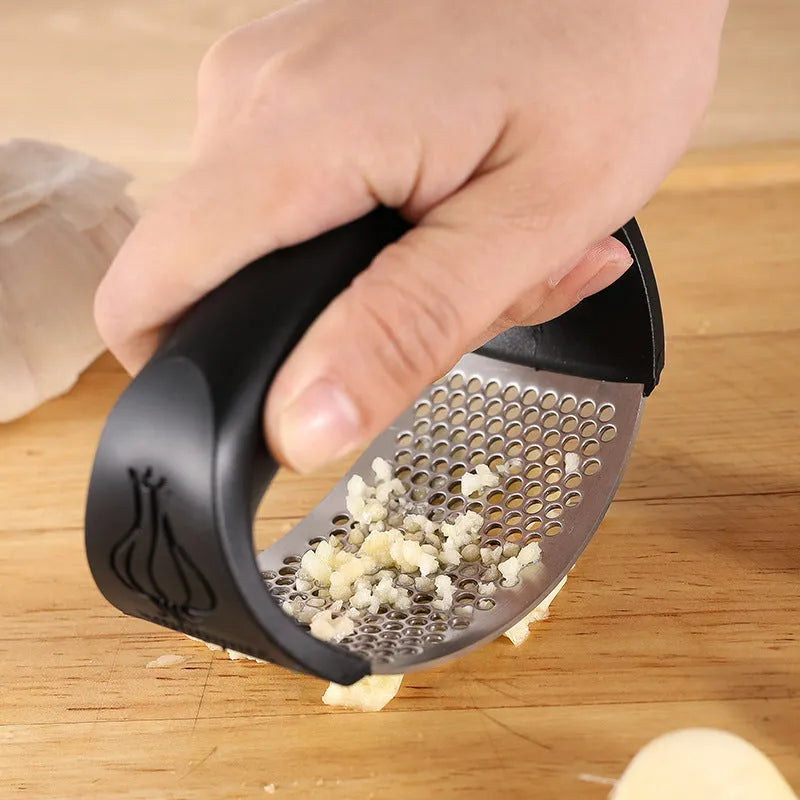 304 stainless steel garlic press in modern design with colour options for kitchen use