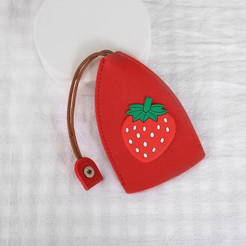 Colourful cartoon pull-out key case made from PU leather showing design options