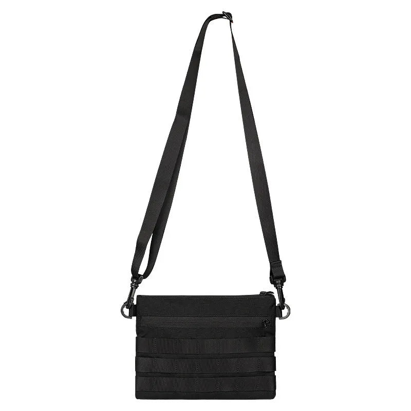 Black military-style Oxford cloth waist bag shown closed, measuring 18cm.