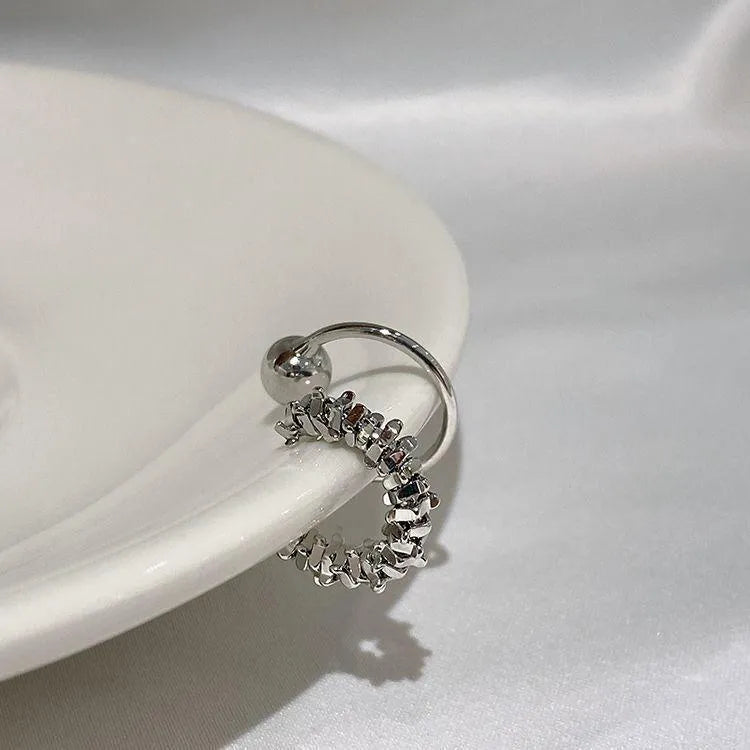 Women's geometric ear clip earrings with irregular shapes and frosty finish in alloy