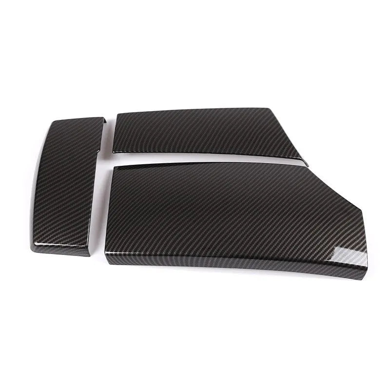 Three ABS plastic armrest box covers with a shiny carbon fibre pattern, shown next to a car centre console.
