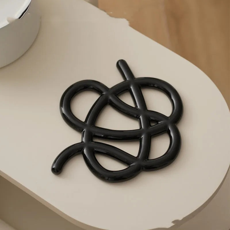 Ceramic heat proof mat in irregular shape with modern solid colour design for table protection