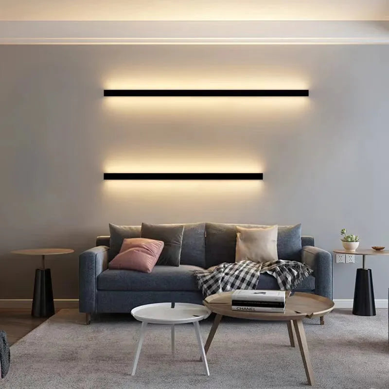 80cm long black aluminium LED strip wall lamp mounted on a wall, showing its simple linear design.
