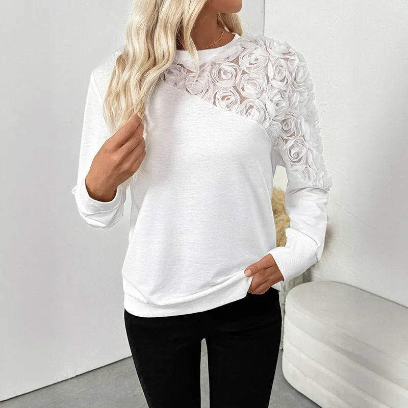White floral pattern long sleeve women's top with loose fit design