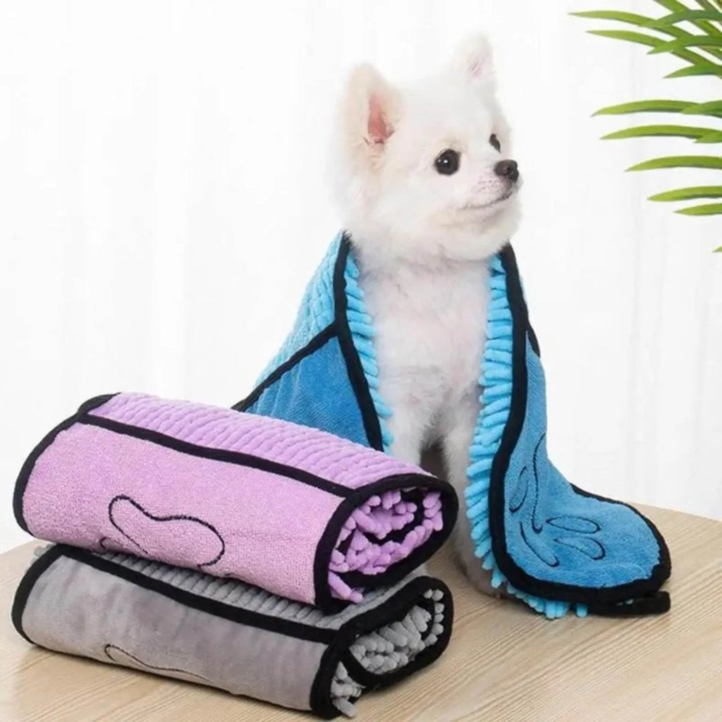 Blue pet bath drying towel for dogs and cats, 62 cm long by 23 cm wide.