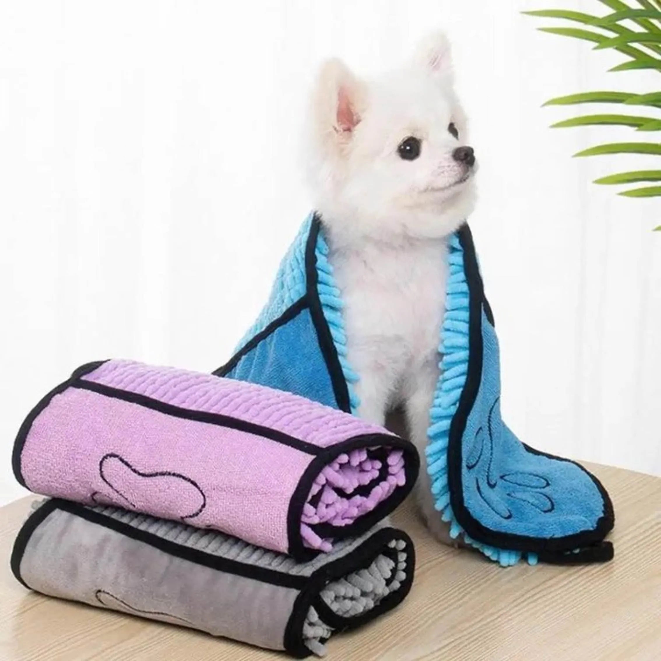 Blue pet bath drying towel for dogs and cats, 62 cm long by 23 cm wide.