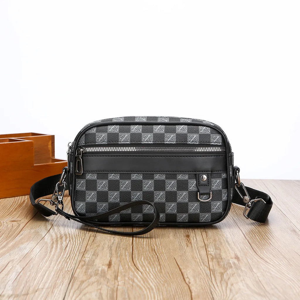 Men's black geometric pattern PU messenger bag shown horizontally with shoulder strap