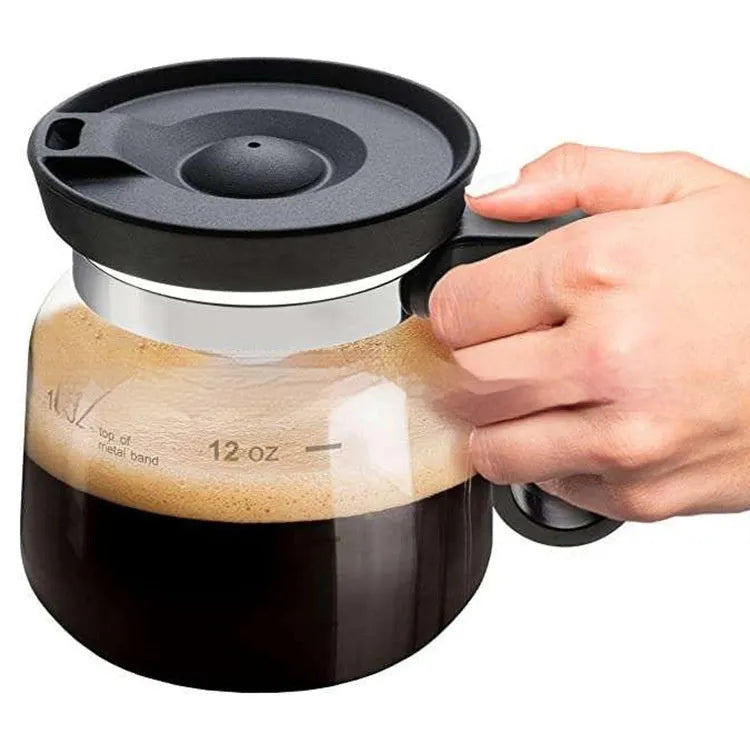 Transparent borosilicate glass coffee maker with silicone cover showing 355-473ml capacity