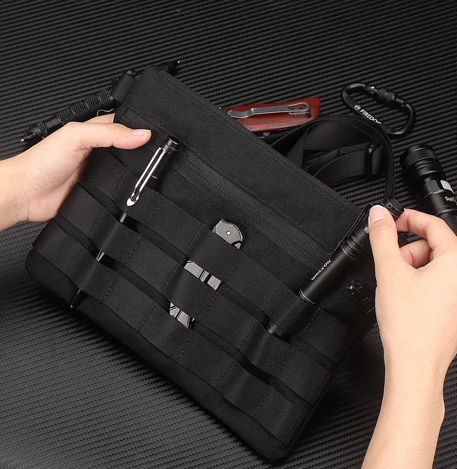 Black military-style Oxford cloth waist bag shown closed, measuring 18cm.