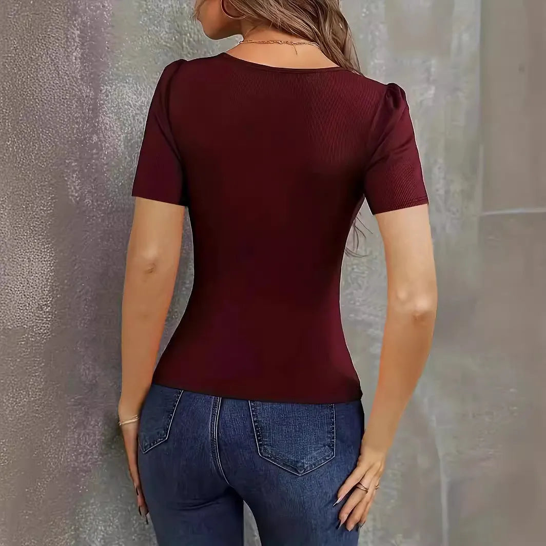 Women's wine red polyester knitted short sleeve top with low neckline and slim fit silhouette