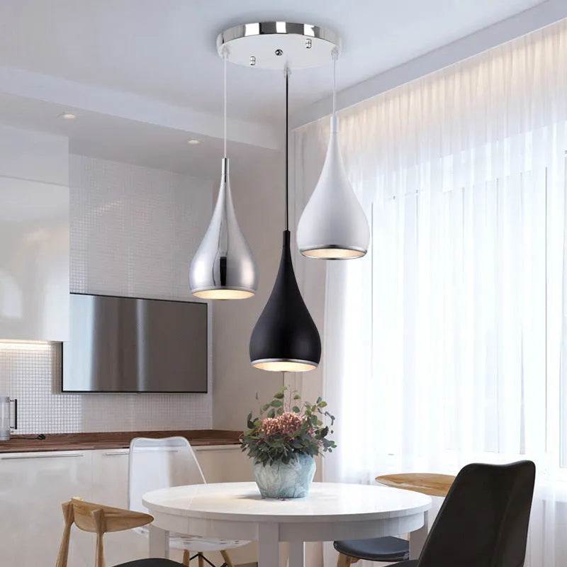 Iron minimalist chandelier in black finish with three head configuration for bedroom or living room lighting