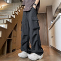 Plus size women's loose fit straight-leg waterproof trousers in black, grey, or white.