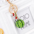 Green watermelon-shaped zinc alloy keychain measuring 12cm