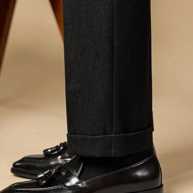 Men's polished leather tassel loafers in black and coffee colours with traditional British styling