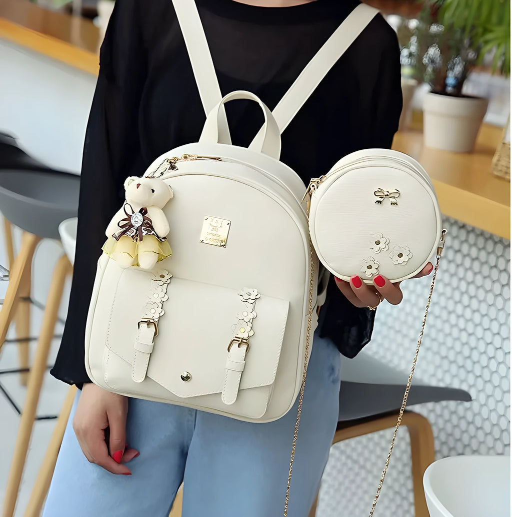 Women's 3-piece floral pattern bag set showing backpack, shoulder bag and card purse in matching design