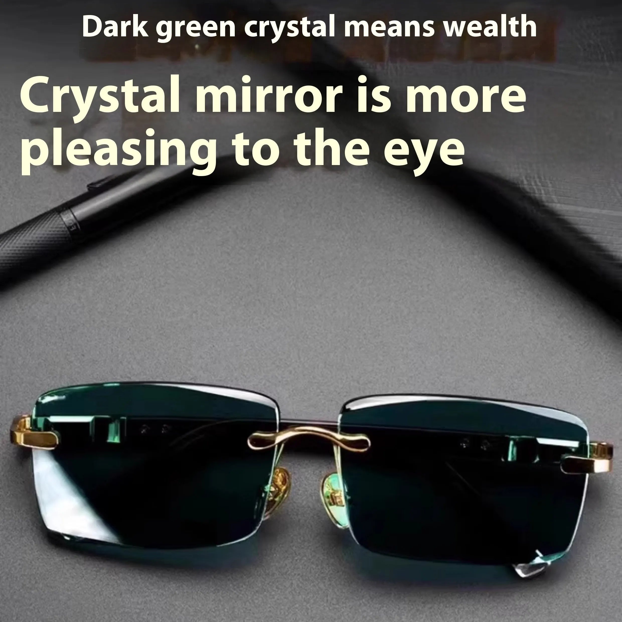 A pair of frameless sunglasses with dark green crystal lenses, shown with a soft case and cleaning cloth.