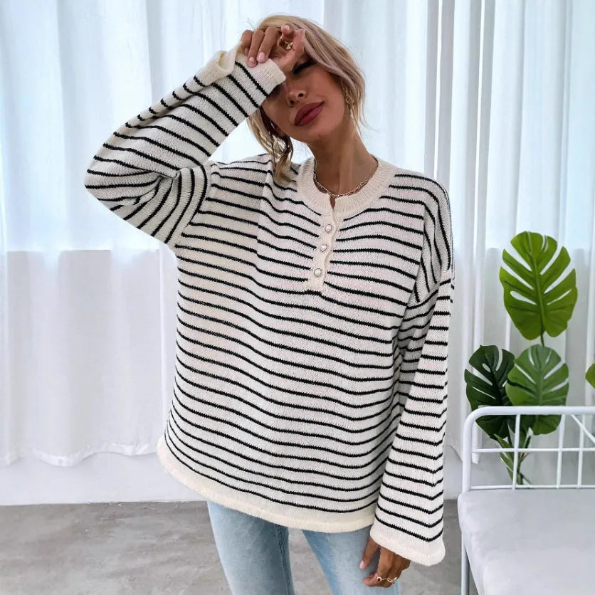 Black striped women's long sleeve top with drop shoulder design and button front
