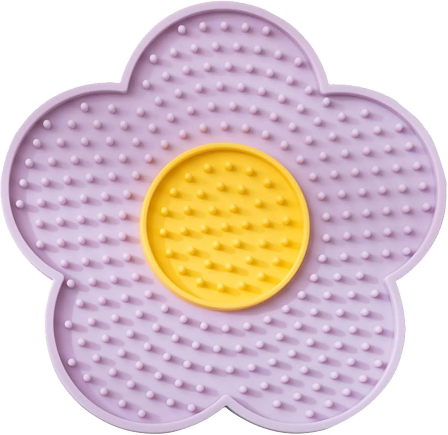 Flower-shaped blue silicone pet lick mat with suction cups on a smooth surface