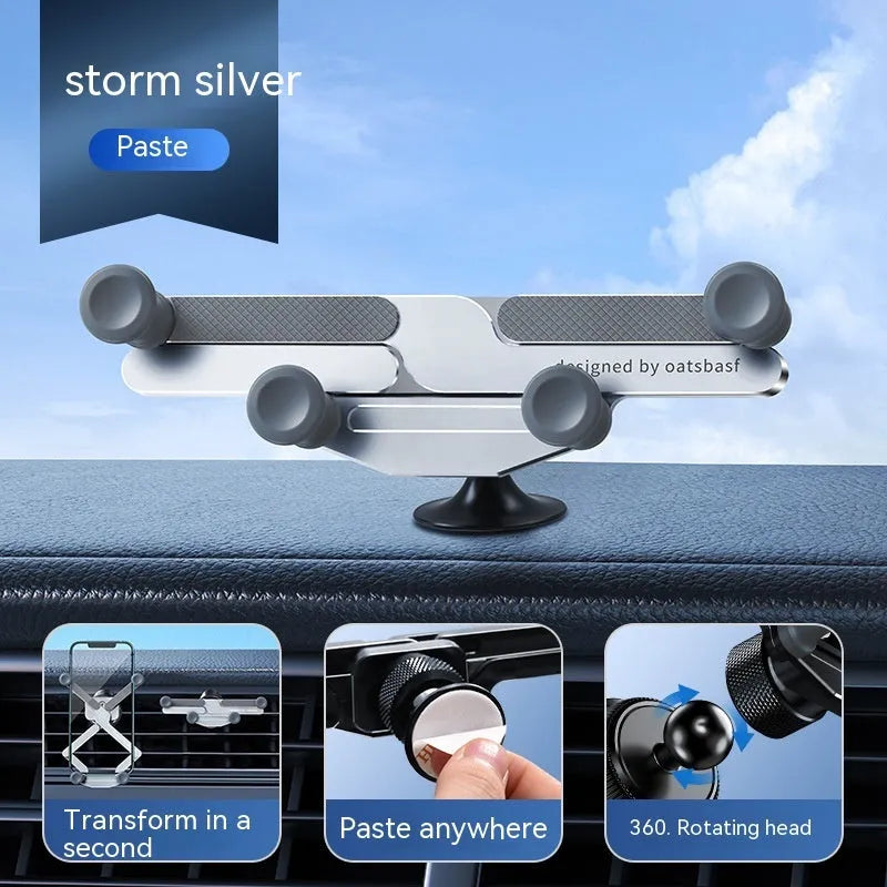 Silver invisible alloy car phone holder mounted on vehicle air outlet with mobile phone in position