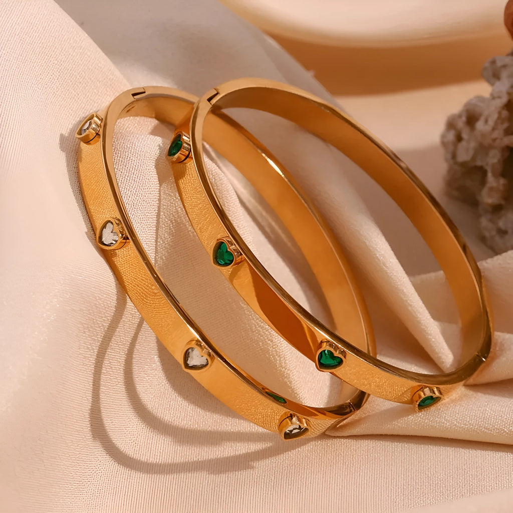 Stainless steel women's bracelet with peach heart design and micro-inlaid detailing in electroplated golden colour