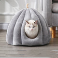 Pumpkin-shaped winter pet bed in orange, closed cave design for cats and small dogs, soft coral fleece fabric.