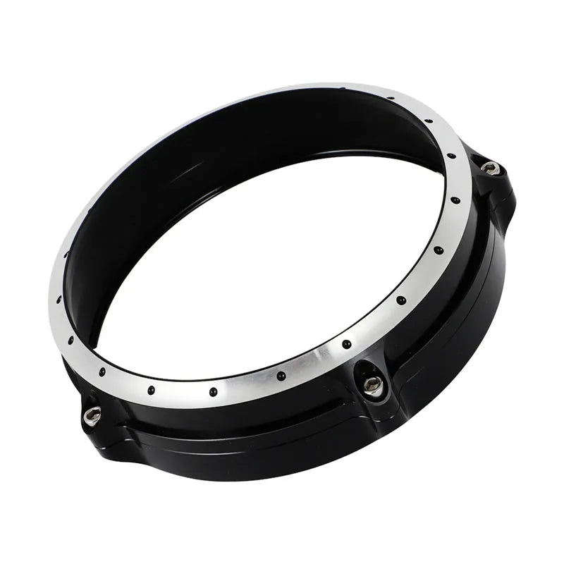 Black CNC aluminium headlight protective frame for a BMW R Nine T Scrambler motorcycle.