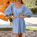 Orange red children's backless dress with square collar and puff sleeves, A-line skirt.