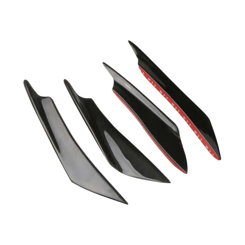 Set of four carbon fibre pattern automotive bumper blades mounted on vehicle