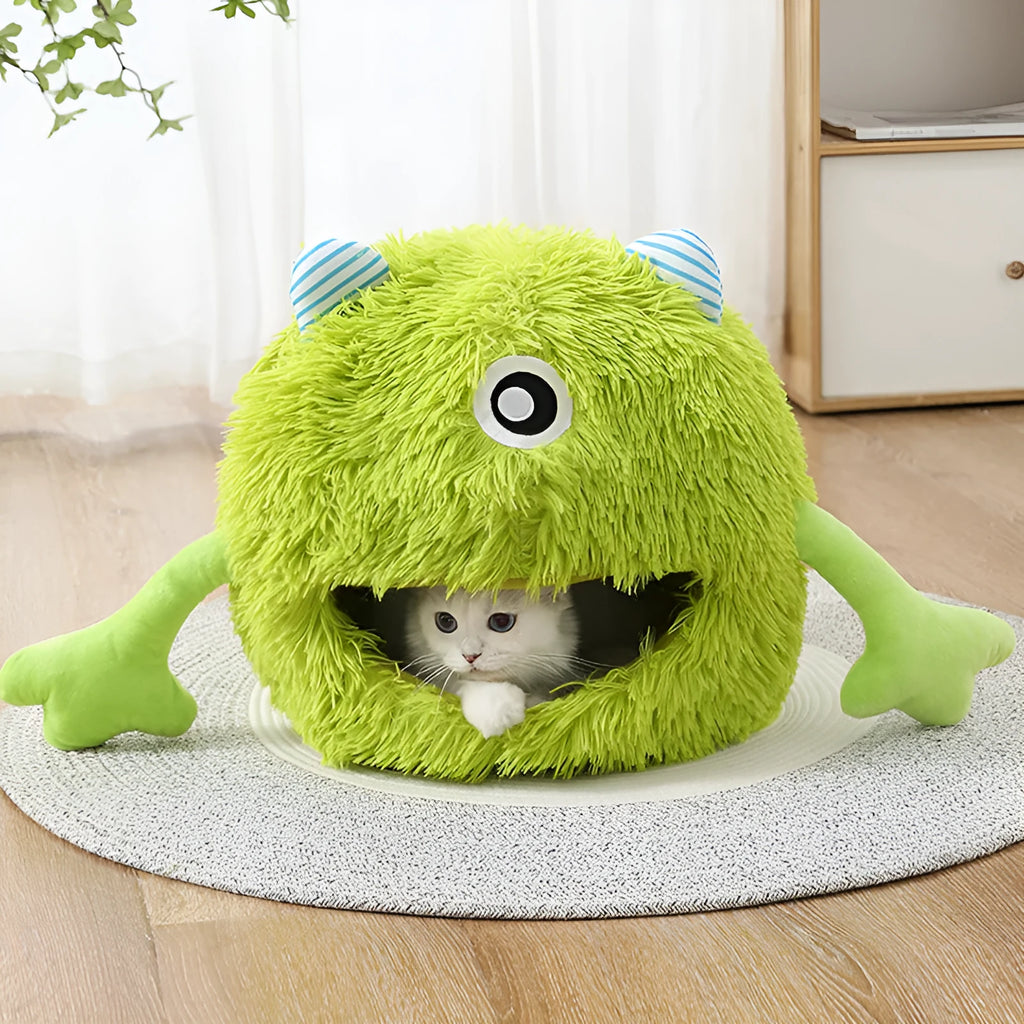 Round fluffy cat bed for indoor cats with self-warming feature and non-slip base