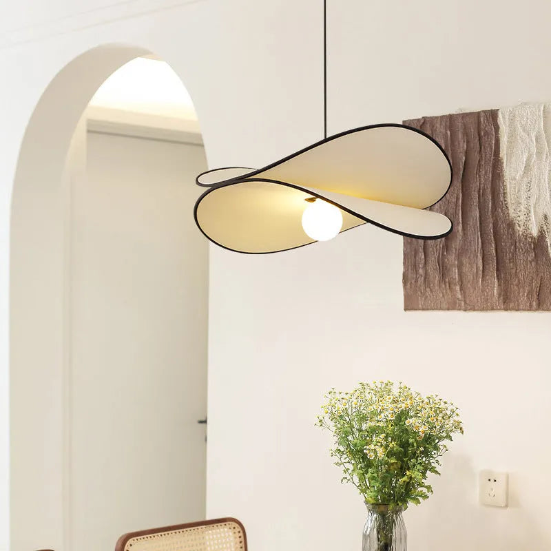 French style artistic fabric chandelier pendant light with a textured shade in a modern bedroom setting.