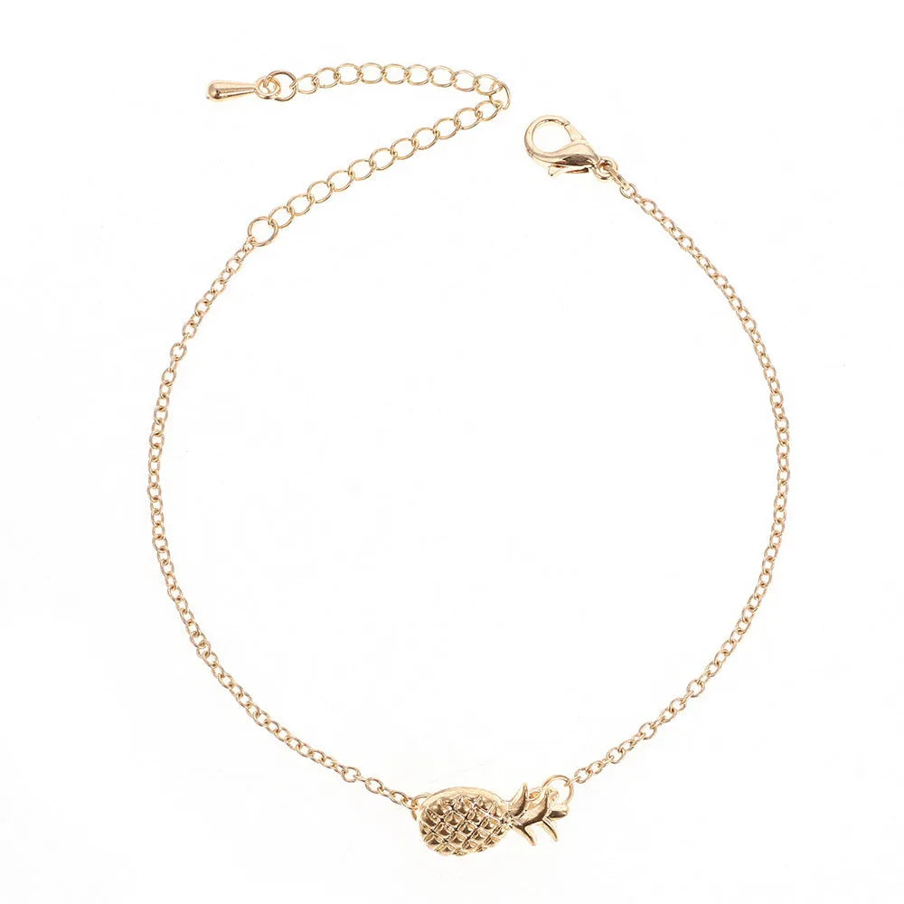 Gold or silver alloy women's bracelet with pineapple charm and adjustable closure