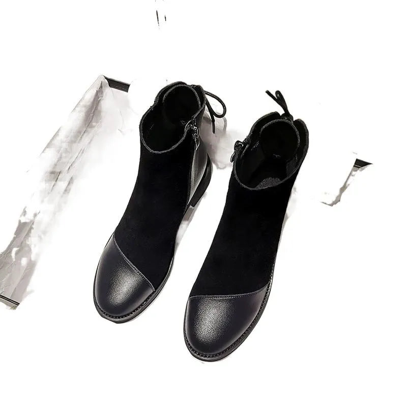 Women's black soft leather Martin boots with side zip and round toe design