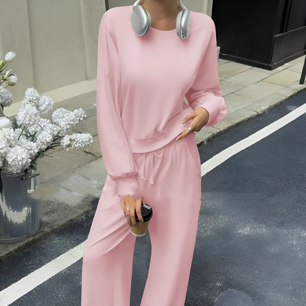 Women's solid colour polyester two-piece set with long sleeve top and trousers in street hipster style.