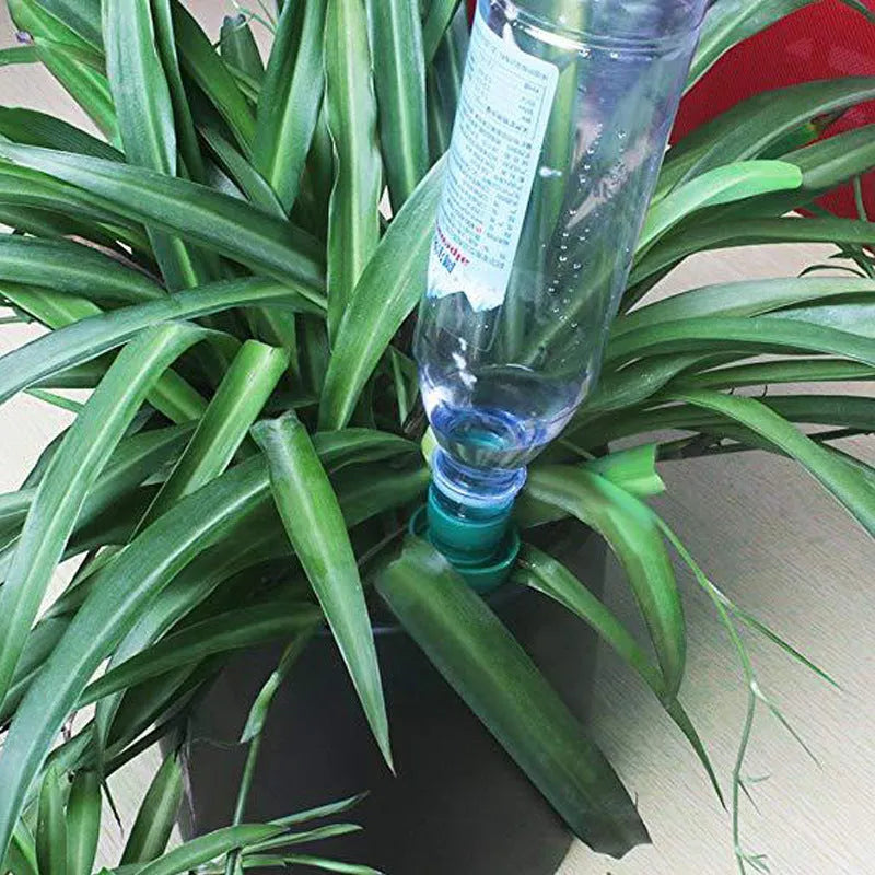 Green ceramic plant water dripper for connecting to cola bottles for automatic garden irrigation