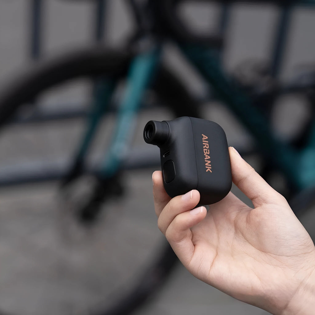 AS100 black electric bike pump with USB cable and waterproof storage bag