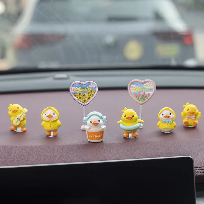 PVC duckling car decoration set with six cartoon duck ornaments and one greeting sign