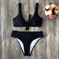 Women's polyester bikini set in solid colours with sleeveless design