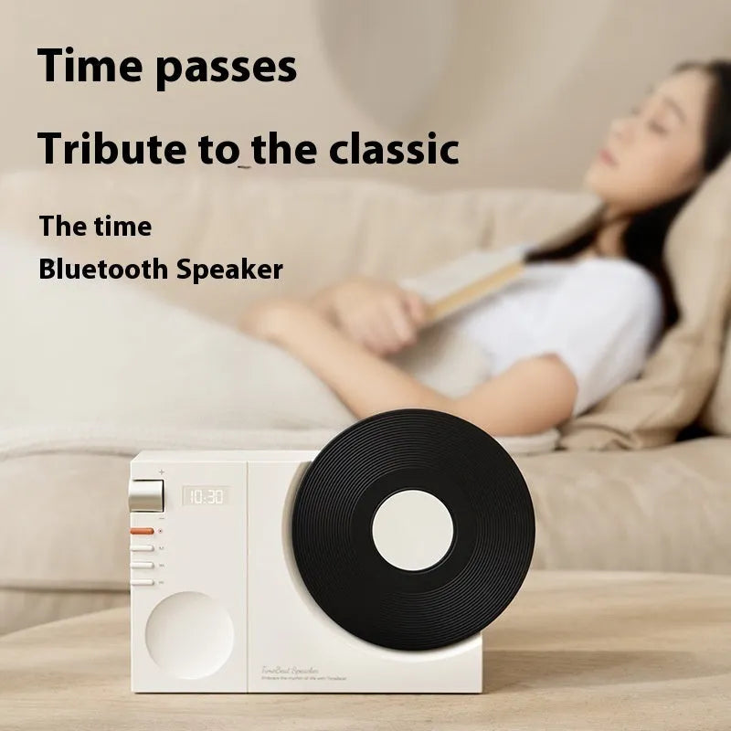 Compact portable Bluetooth speaker in Obsidian Black colour showing card insertion slot and USB charging port.