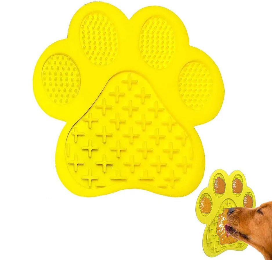 Blue bone-shaped silicone dog licking mat with suction cups on the back for sticking to smooth surfaces.
