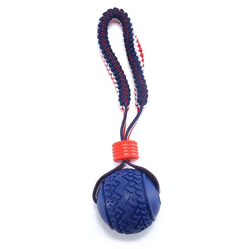 Blue rubber dog ball with attached rope toy measuring 6.5cm diameter