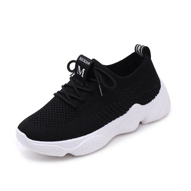 Women's white sport shoes with thick rubber soles and woven upper fabric with front strap closure
