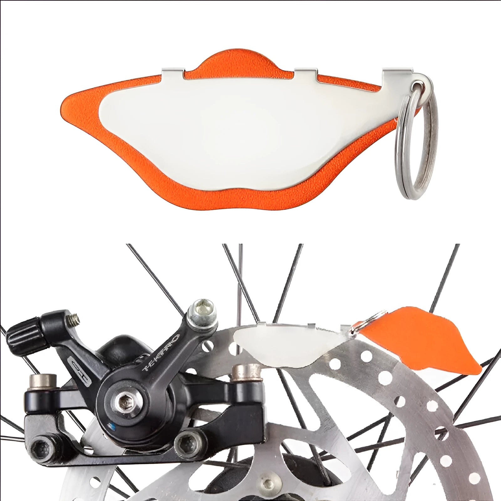 Black and orange mountain bike disc brake linings with adjustment flap