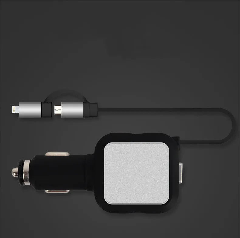 Black and gold dual USB car charger with retractable cable shown plugged into vehicle socket